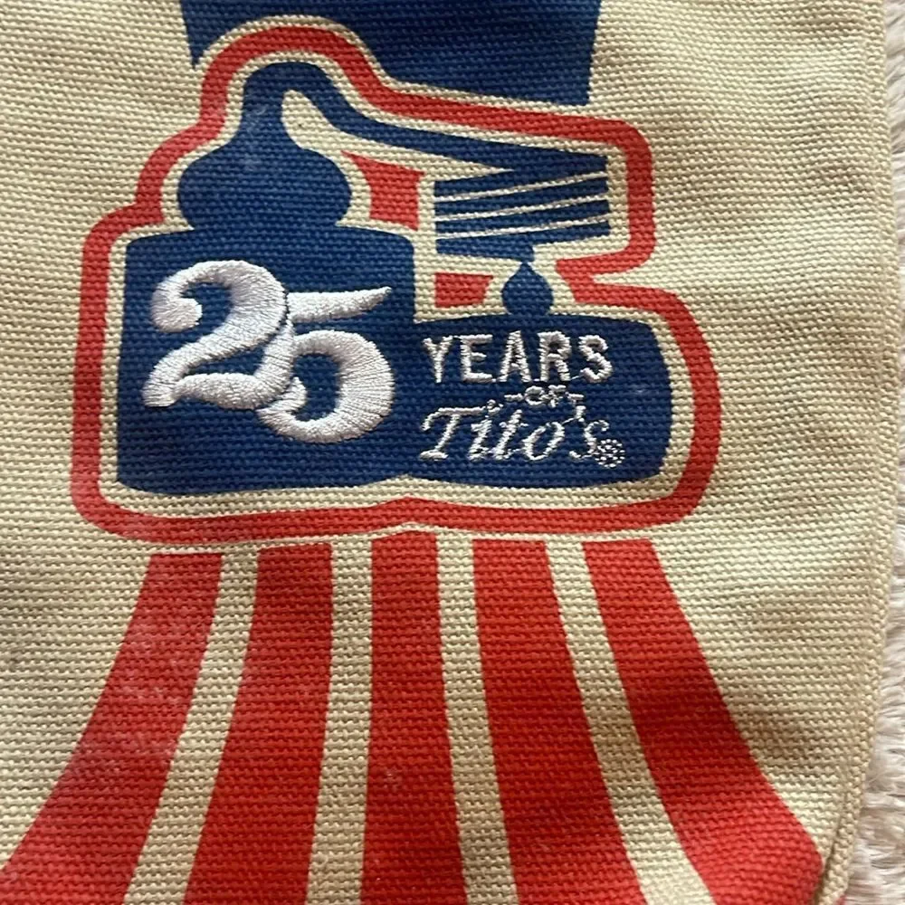 NWT Titos 25th anniversary commemorative bottle cover